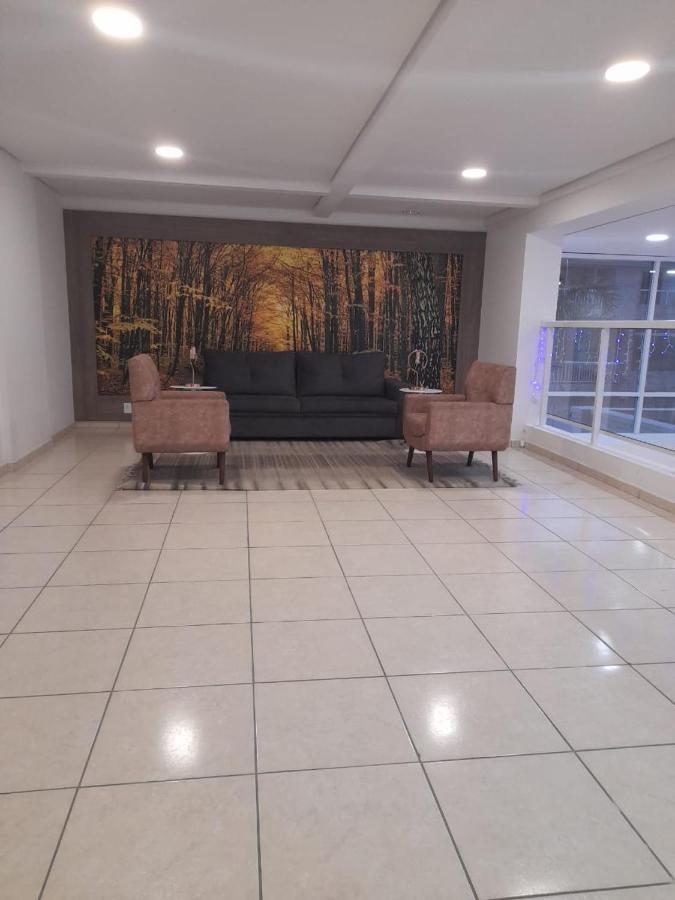 Lazer De Resort A Poucos Passos Da Praia Guarujá Esterno foto